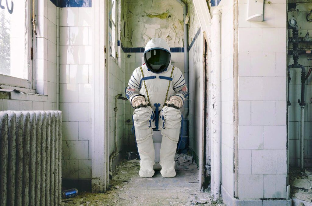 astronaut on toilet